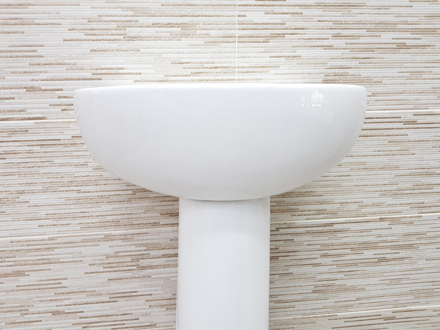 Delta White Wall Mounted Basin & Pedestal Set Front view